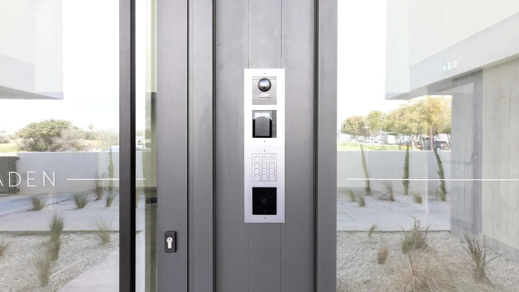 Building entrance with a video intercom and keypad access panel
